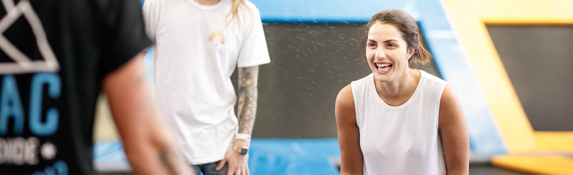 lady smiling on trampoline